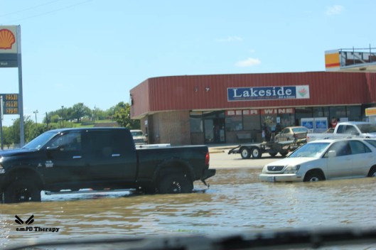 Cars sitting in flood waters